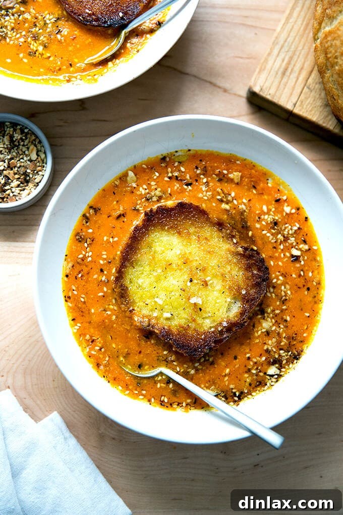 Golden Velvet Carrot Saffron Soup with Almond Dukkah Crunch 2 Vibrant Saffron and Carrot Soup with Olive Oil Toasted Bread and Toasted Almond Dukkah – A Culinary Delight.