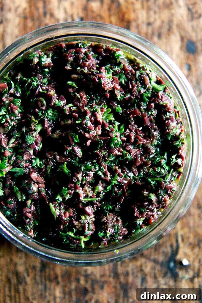 Sparkling Bites: Your Go-To Guide for New Year's Eve Appetizers 12 Homemade Olive Tapenade with Capers and Fresh Parsley