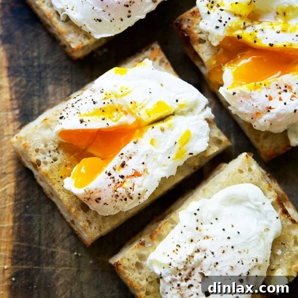 Four poached eggs on toast, a simple and elegant meal.