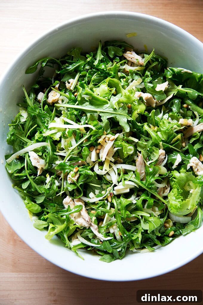Delicious Roast Chicken Arugula Salad with Toasted Pine Nuts