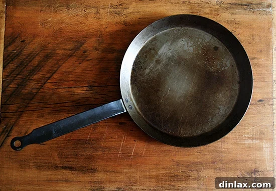 French steel omelet pan A classic French steel omelet pan, ideal for cooking eggs and delicate dishes.