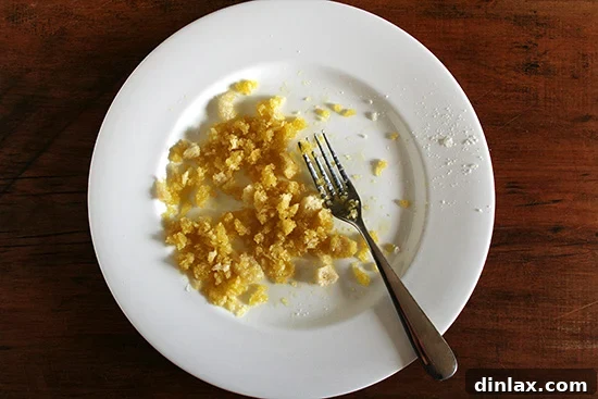 Bread crumbs Breadcrumbs saturated with a generous amount of olive oil, demonstrating the 'oversaturated' technique from Zuni Cafe.