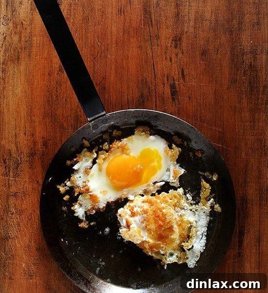Zuni Cafe's signature fried eggs in crispy breadcrumbs, a gourmet breakfast or dinner option.