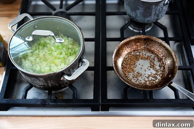 Curried Carrot Ginger Coconut Bliss 9 Sweating vegetables and toasting coriander seeds simultaneously to enhance their aromatic qualities.