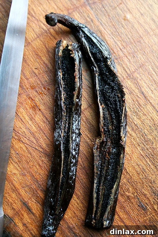 Glistening vanilla beans, a prized ingredient for exquisite desserts.