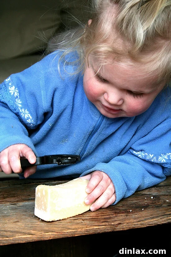A young helper, Ella, actively participating in the kitchen, adding a touch of charm to the cooking process.