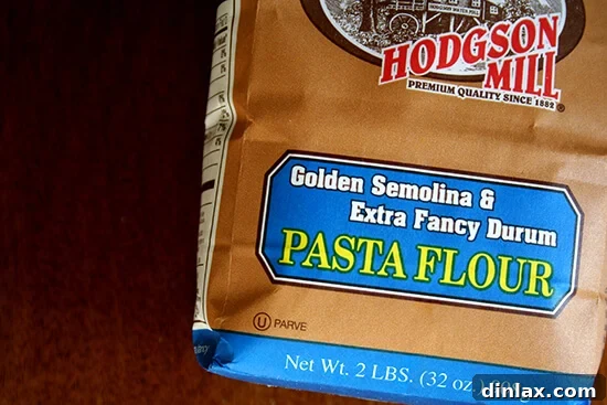 Semolina Flour A close-up shot of golden semolina flour, an essential ingredient for creating the unique texture and flavor of this rustic bread.