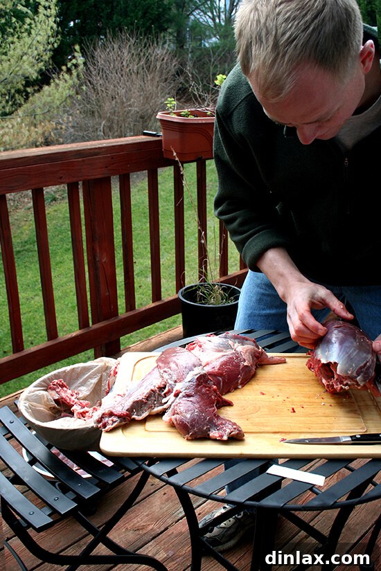 Ben, carving a deer for venison backstrap