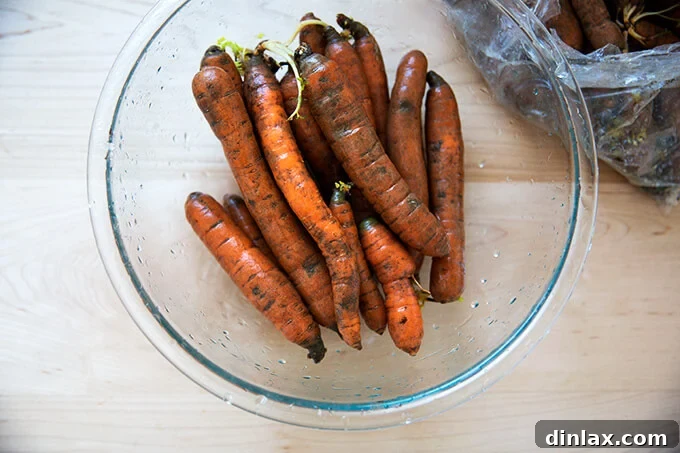 Vibrant Carrot Quinoa Salad with Tangy Tahini Dressing 3 Fresh carrots, washed and ready for preparation