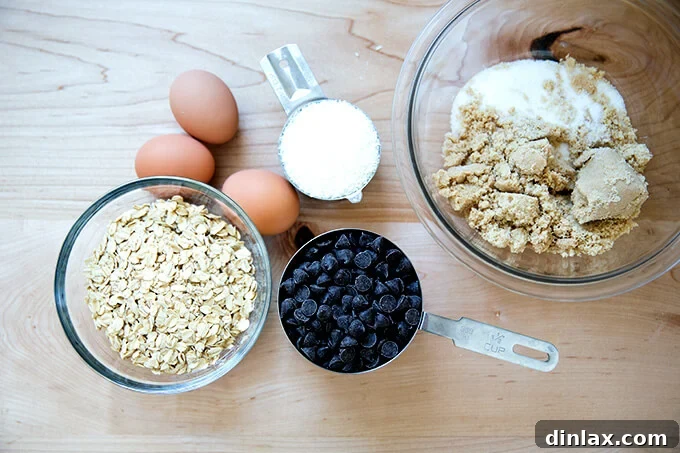 Eggs, sugars, oats, chocolate chips, and coconut for the gooey topping