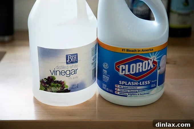 Restore Your Le Creuset Cookware's Luster 3 Warning symbol next to a bottle of bleach and vinegar, indicating not to mix these chemicals