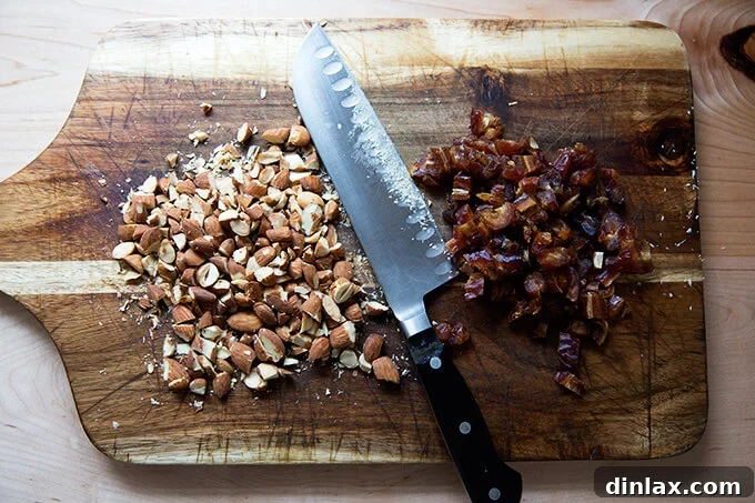 Roughly chopped Medjool dates and salted almonds, prepared for the salad mix.
