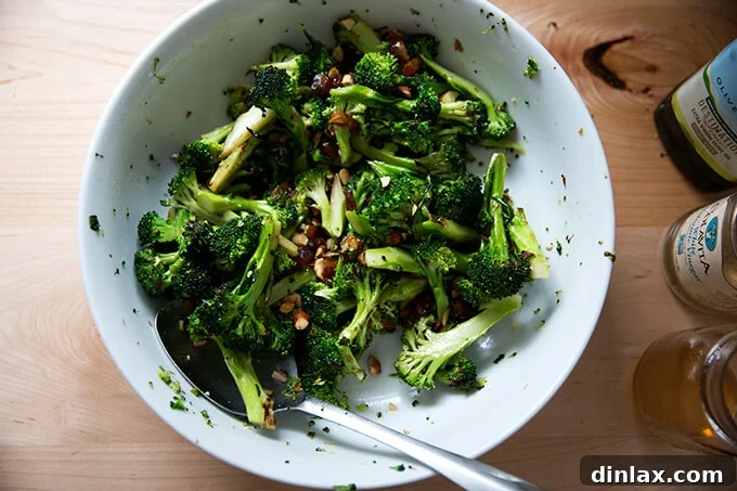 Dates and almonds thoroughly tossed with the charred broccoli and dressing.