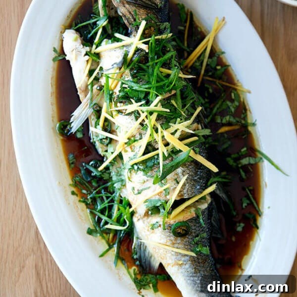 Ginger-Scallion Infused Steamed Whole Fish 22 Chinese-style whole Branzino with ginger, scallions and soy sauce