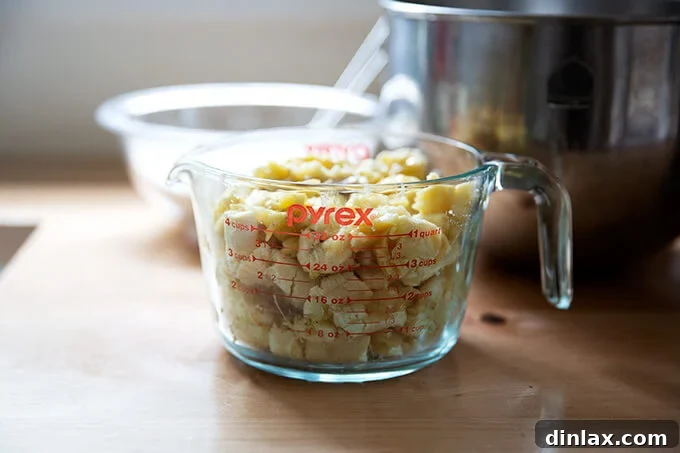 Mrs Myers Legendary Sweet Moist Banana Bread 5 A bowl filled with a quart of perfectly mashed ripe bananas, ready for mixing.