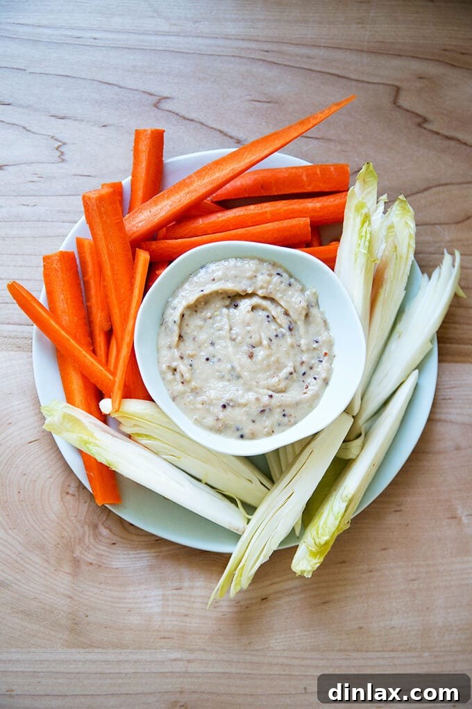 Creamy White Bean Dip with Zesty Chutney, served with Endive and Carrots