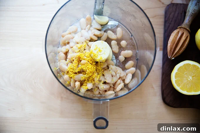 White beans, lemon zest, juice, garlic, and salt, poised for puréeing