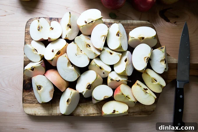 Apples cut into chunks, including cores, for simmering