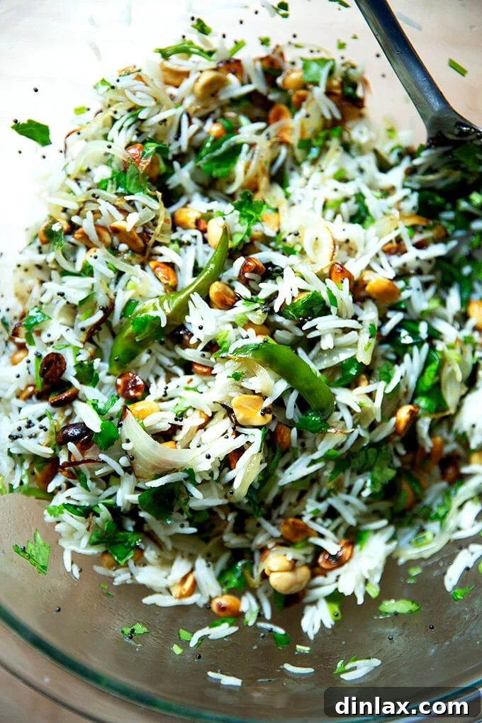 A beautifully presented bowl of Indian Fried Rice, ready to be enjoyed, showcasing its rich colors and tempting textures.