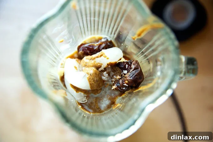 Mocha Date Banana Bliss Smoothie 3 An overhead shot showcasing a blender filled with all the fresh and wholesome ingredients ready to be transformed into a delicious coffee smoothie.