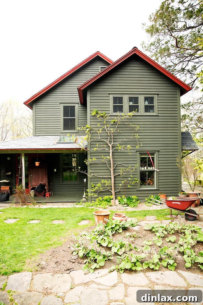 Margaret Roach's meticulously cultivated garden, showcasing lush greenery and vibrant flora in Upstate New York.