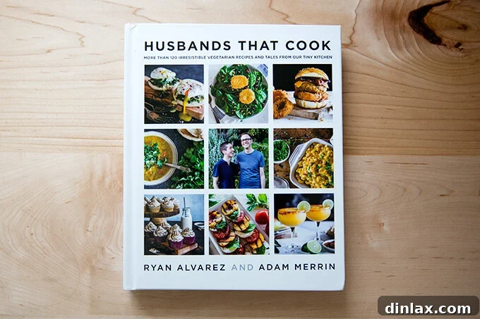 The stylish cover of 'Husbands that Cook' cookbook, featuring enticing vegetarian dishes.