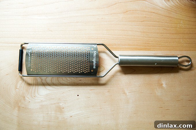 A sleek and sharp microplane grater, a versatile tool for zesting and finely grating ingredients.