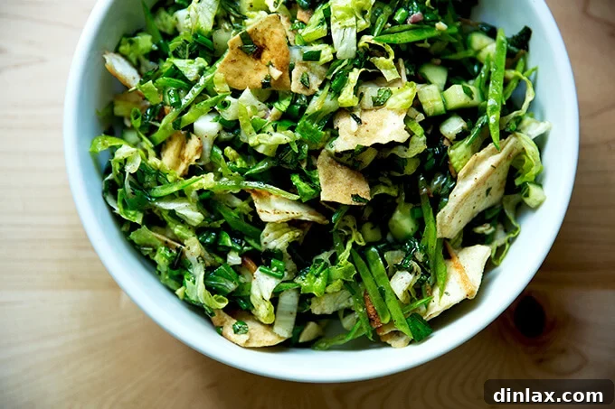 Vibrant Spring Fattoush 13 The finished spring Fattoush salad, beautifully presented on a table, ready to be served and enjoyed as a refreshing and satisfying meal.
