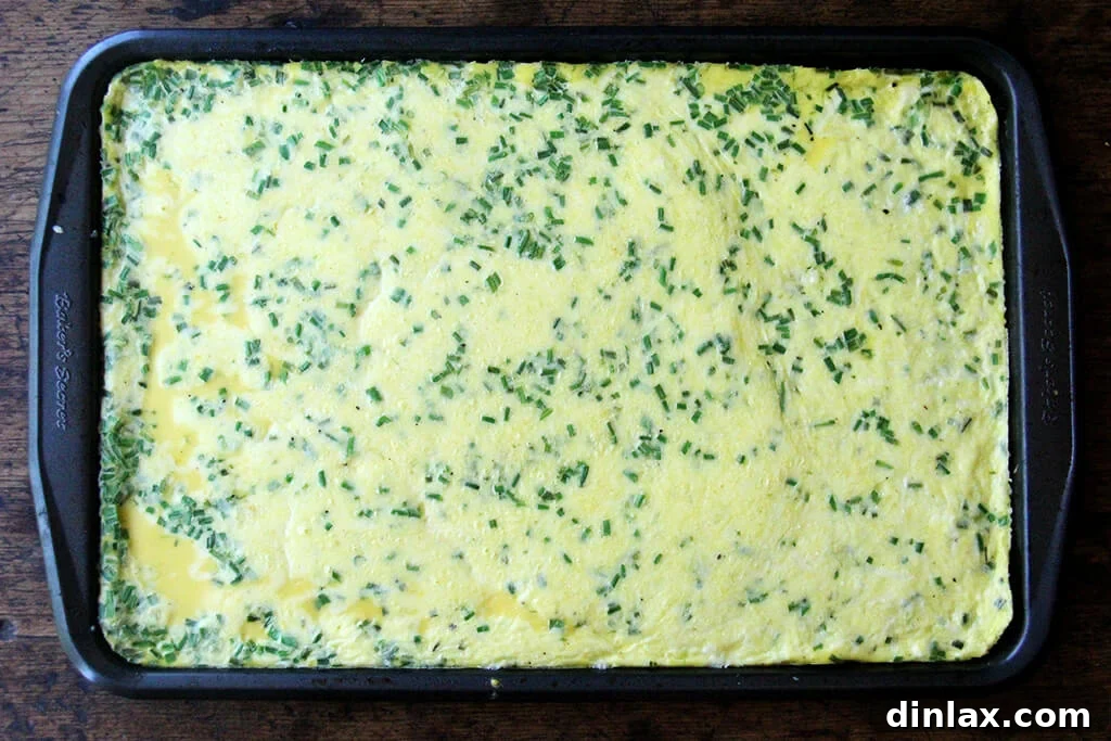 Ultimate Sheet Pan Breakfast Slab Sandwich: Bacon, Egg, and Cheese 5 Just-baked sheet pan eggs.