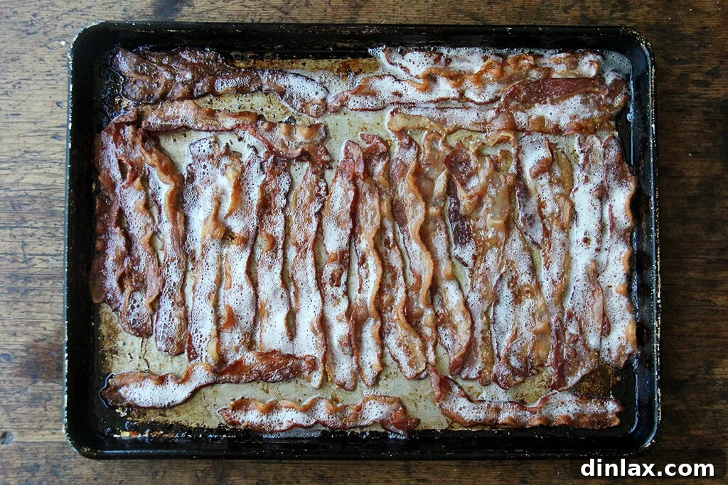Ultimate Sheet Pan Breakfast Slab Sandwich: Bacon, Egg, and Cheese 8 Cooked bacon on a sheet pan