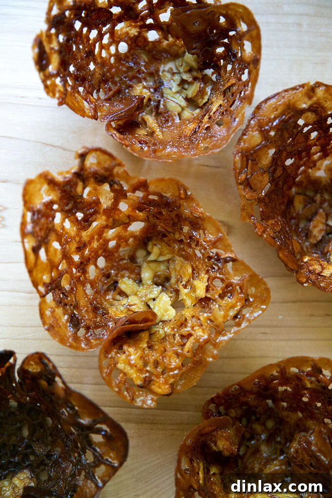 Refreshing Strawberry Sorbet Nestled in Buttery Almond Butterscotch Cookie Cups 16 A stack of golden, delicate almond-butterscotch cookie cups.