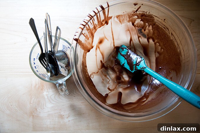 Dirty dishes after preparing chocolate cupcake batter, showcasing the minimal cleanup from a one-bowl recipe.
