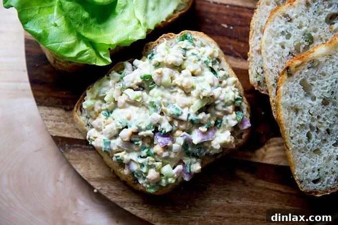 No-tuna tuna salad on a halved slice of three seed bread.