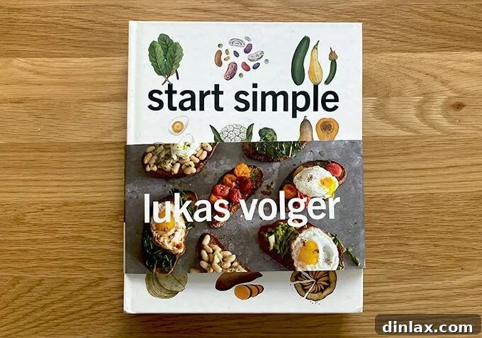The cover of the cookbook 'Start Simple' by Lukas Volger, featuring fresh produce.