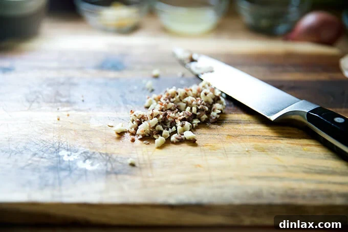 Fire-Kissed Romaine Caesar 4 Minced anchovies and garlic.