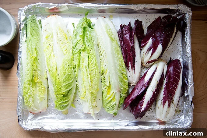 Fire-Kissed Romaine Caesar 8 A sheet pan of Romaine and Trevsio ready to be broiled.