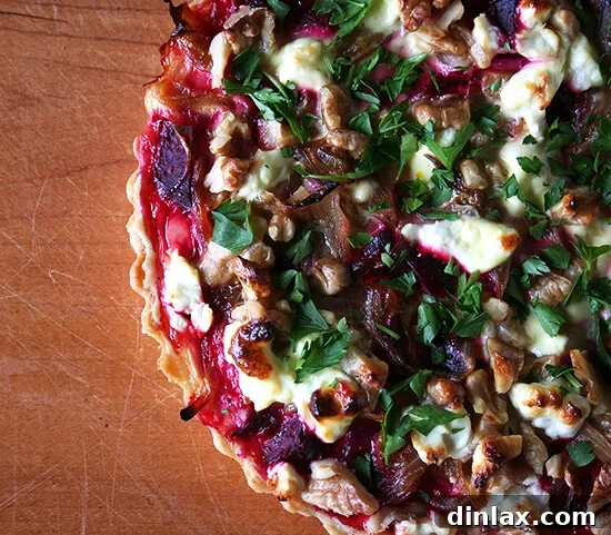 The finished Gordon Hamersley's Beet, Goat Cheese, and Walnut Tart, vibrant and delicious.