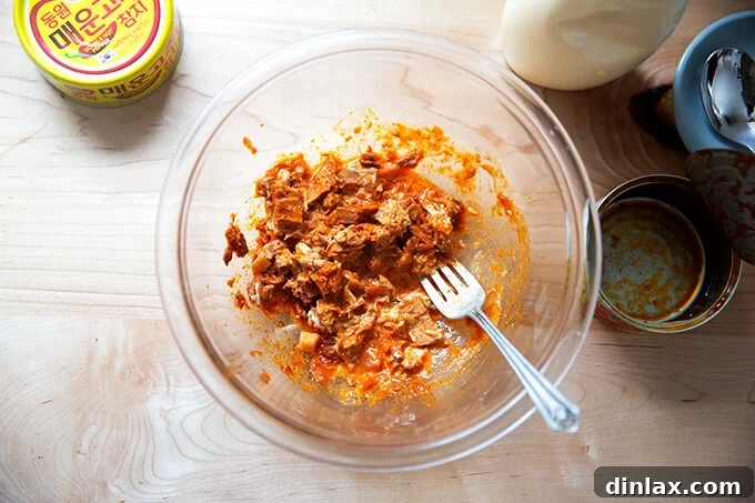 Korean Fire Tuna Crostini 5 A bowl of Korean double hot tuna beautifully mixed with creamy Kewpie mayonnaise, showcasing its appealing texture.