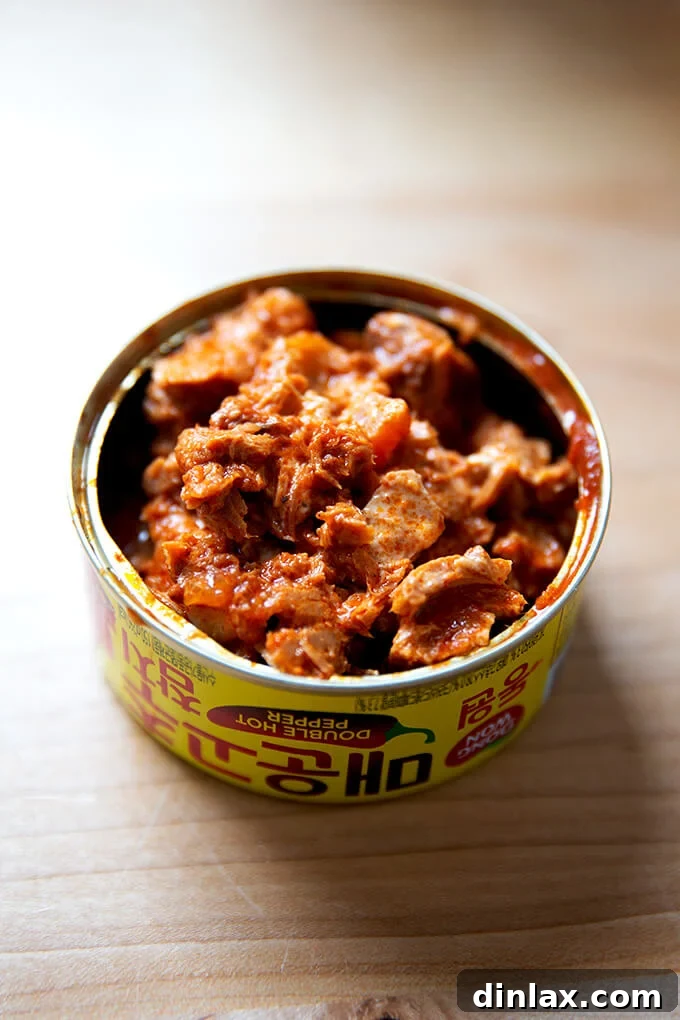 Korean Fire Tuna Crostini 6 The Korean double hot tuna and Kewpie mayonnaise mixture artfully returned to its original can for an authentic Momofuku-style presentation.