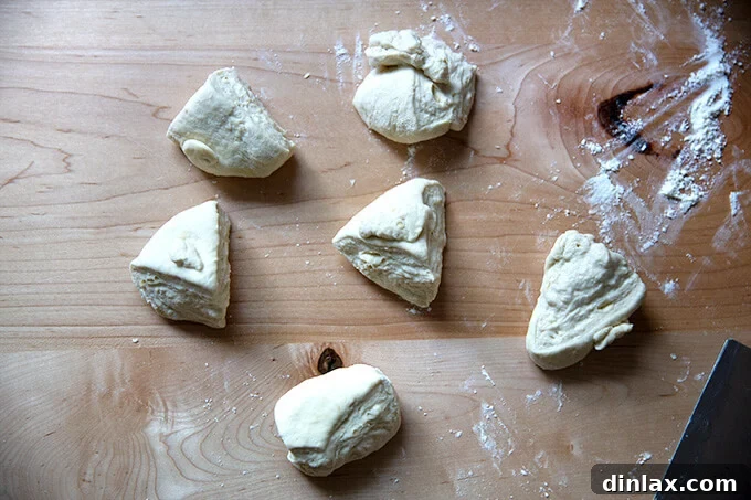 Your Guide to Irresistible Homemade Pita 13 6 portions of pita bread dough, roughly equal in size.