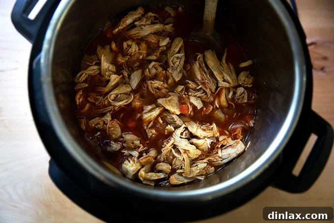 Smoky Instant Pot Chicken Tinga 11 An Instant Pot filled with just-cooked chicken tinga.
