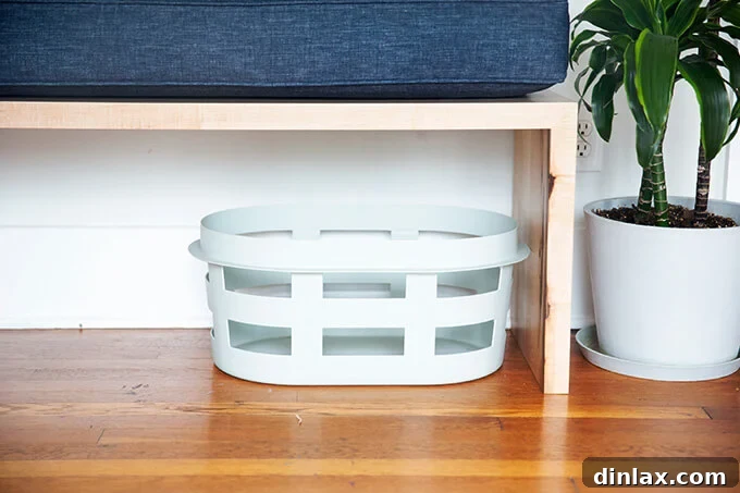 A modern, minimalist Danish laundry basket, adding style to a living room.