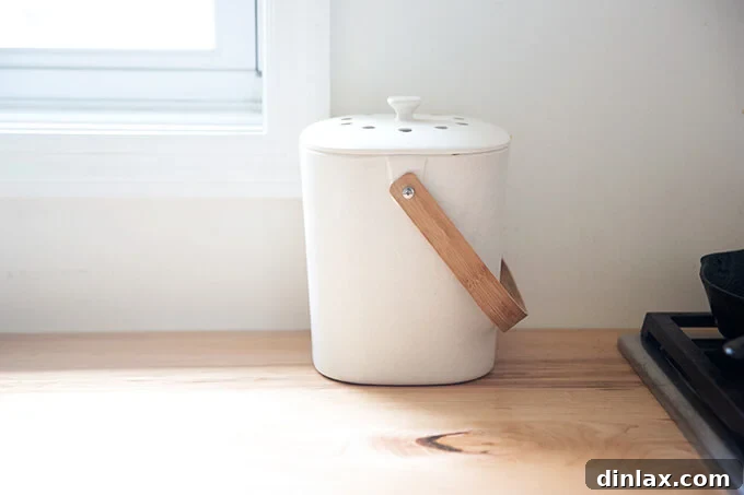 A stylish and practical bamboo compost bin for the kitchen.