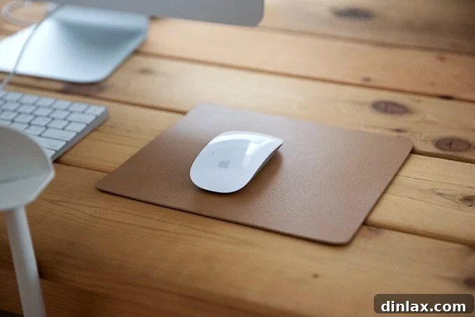 A luxurious leather mousepad, enhancing a desk with sleek design.