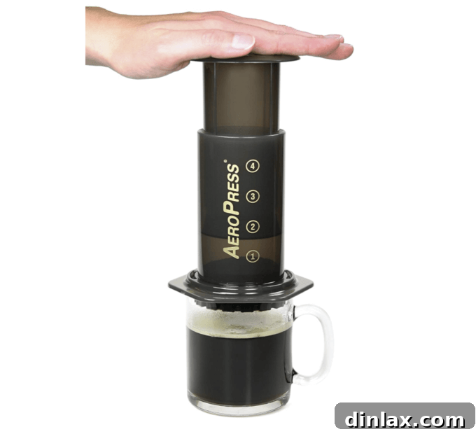 The Aeropress coffee maker, known for brewing rich, smooth coffee quickly.