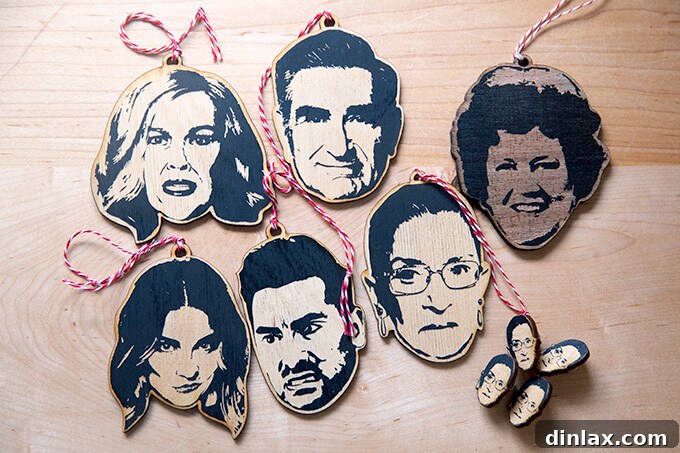 Decorative ornaments featuring Ruth Bader Ginsburg, Julia Child, and the Schitt's Creek family.