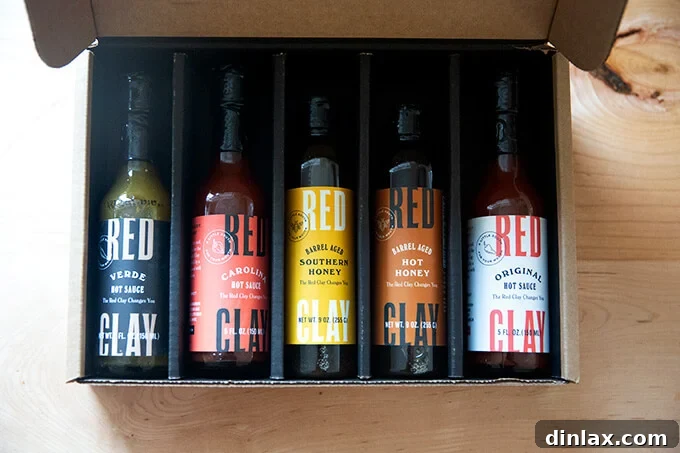 Red Clay Hot Sauce bottles, a gourmet selection for spice enthusiasts.