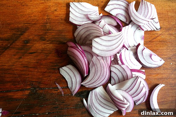 Uniformly Sliced Onions Ready for Sautéing or Caramelizing