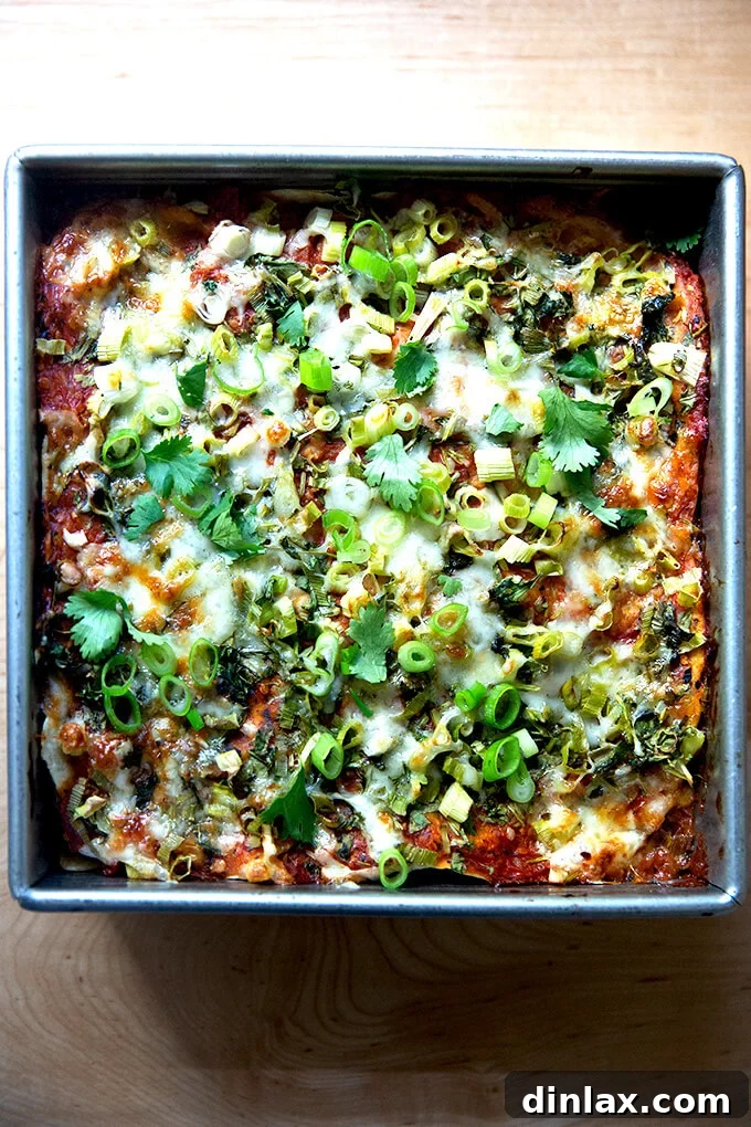 Southwestern Veggie Tortilla Stack 10 A close-up of the freshly baked vegetarian tortilla casserole, garnished with an abundance of fresh green herbs, ready to be served.