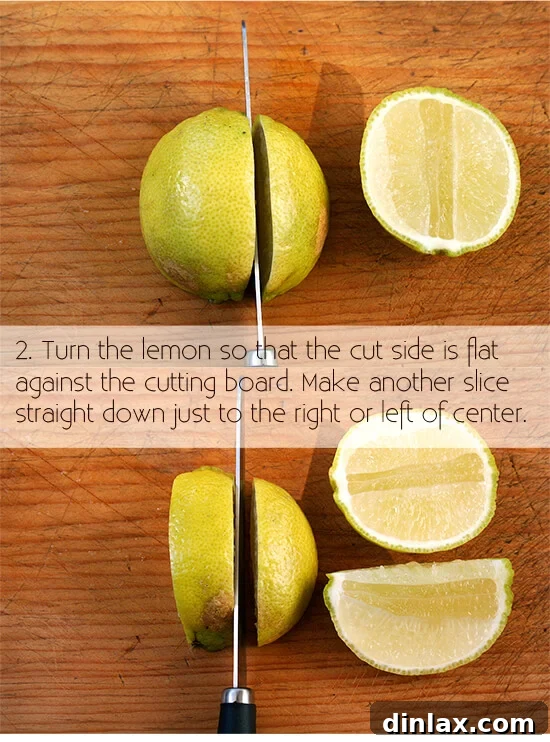 cutting a lemon for garnish, step 2: cut in half lengthwise cutting a lemon for garnish, step 2: halving the lemon lengthwise